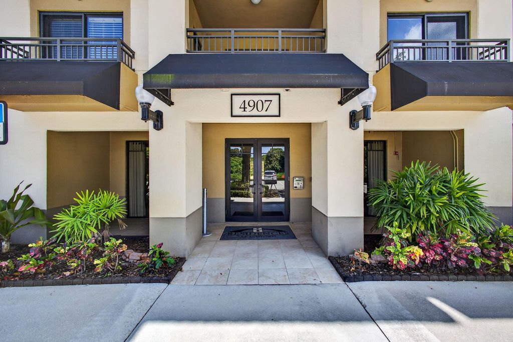 Photo of 4907 Midtown Lane #1413, Palm Beach Gardens, FL 33418 (MLS # R11112628)