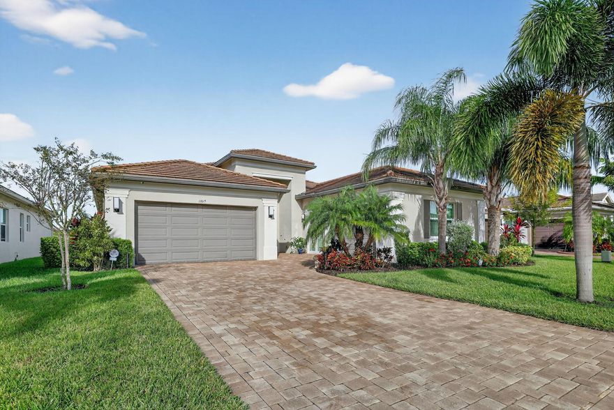 Move-In Ready Caroline Model in Valencia Cay at Riverland - 55+ Active Adult Community. Don't wait to build--this stunning lakefront Caroline Model home in Valencia Cay at Riverland is move-in ready and truly one of a kind! Skip the wait for new construction and start enjoying the resort-style Valencia lifestyle today in this beautifully appointed Vintage Series home located in one of Florida's premier 55+ active adult communities. This gorgeous residence offers 2 bedrooms plus a versatile clubroom/optional 3rd bedroom, 2.5 baths, and an open-concept layout that seamlessly connects the kitchen, great room, and dining area, all with breathtaking tropical lake views. Interior highlights include: Elegant tile flooring throughout the main living areas. Hunter Douglas window treatments.