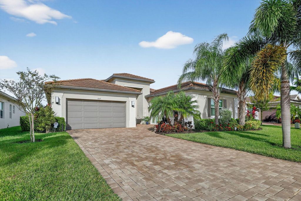 Photo of 11015 SW Ivory Springs Lane, Port Saint Lucie, FL 34987 (MLS # R11130664)