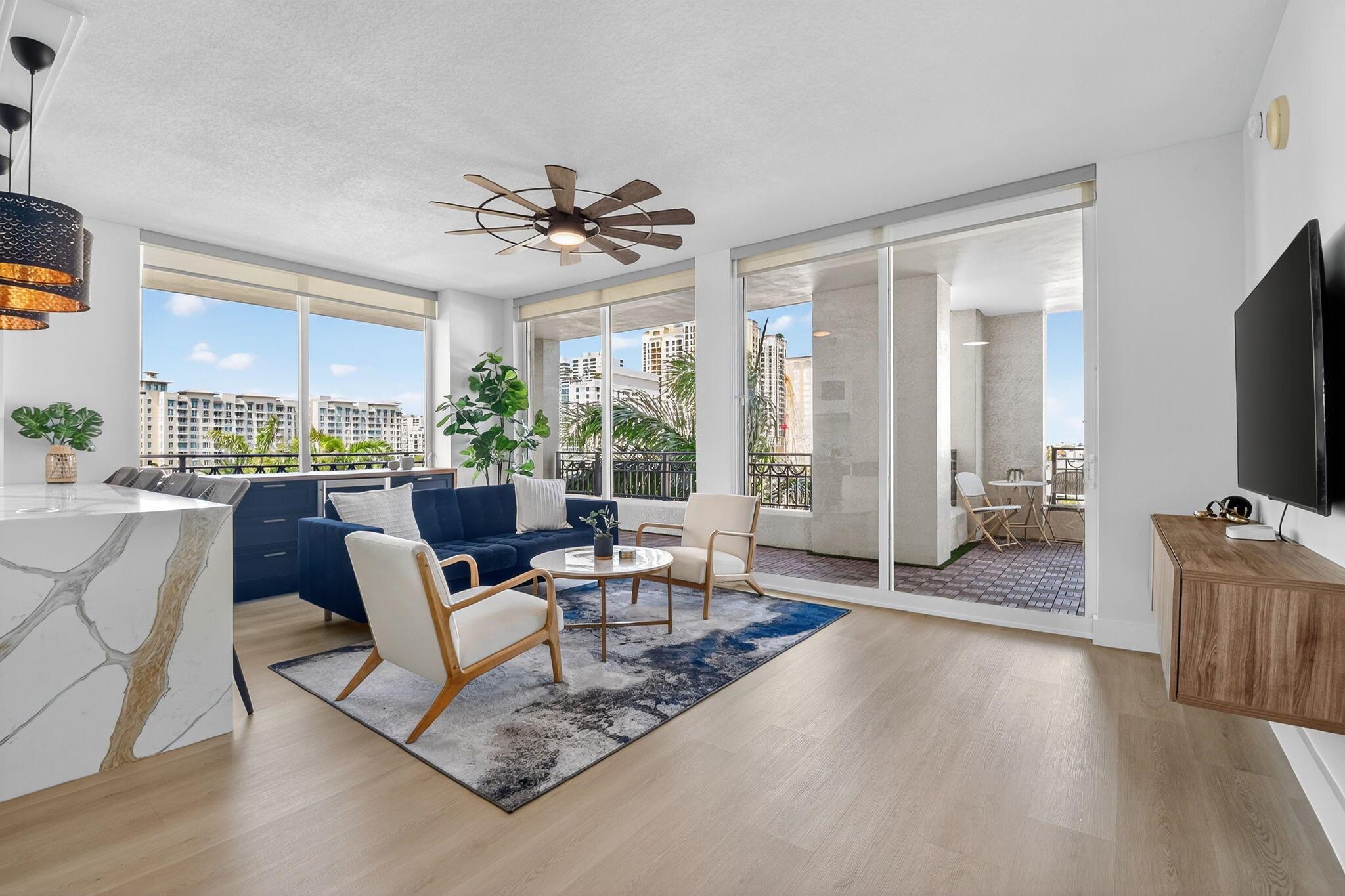Recently renovated from top to bottom with designer finishes -- this stunning 3-bedroom corner unit in CityPlace South Tower is the one you've been waiting for! With a brand-new chef's kitchen, custom built-ins, high-end appliances, and wide-plank luxury flooring throughout, no detail was overlooked. Natural light pours in through floor-to-ceiling impact windows, highlighting the sleek, modern design and open layout.Downtown West Palm Beach is in the midst of a major transformation, quickly becoming one of South Florida's most sought-after destinations for luxury living, investment, and innovation. With billions in new development underway -- including Class A office towers, world-renowned restaurants like Eataly, Milos, and Harry's of New York, five-star hotels, luxury residences,