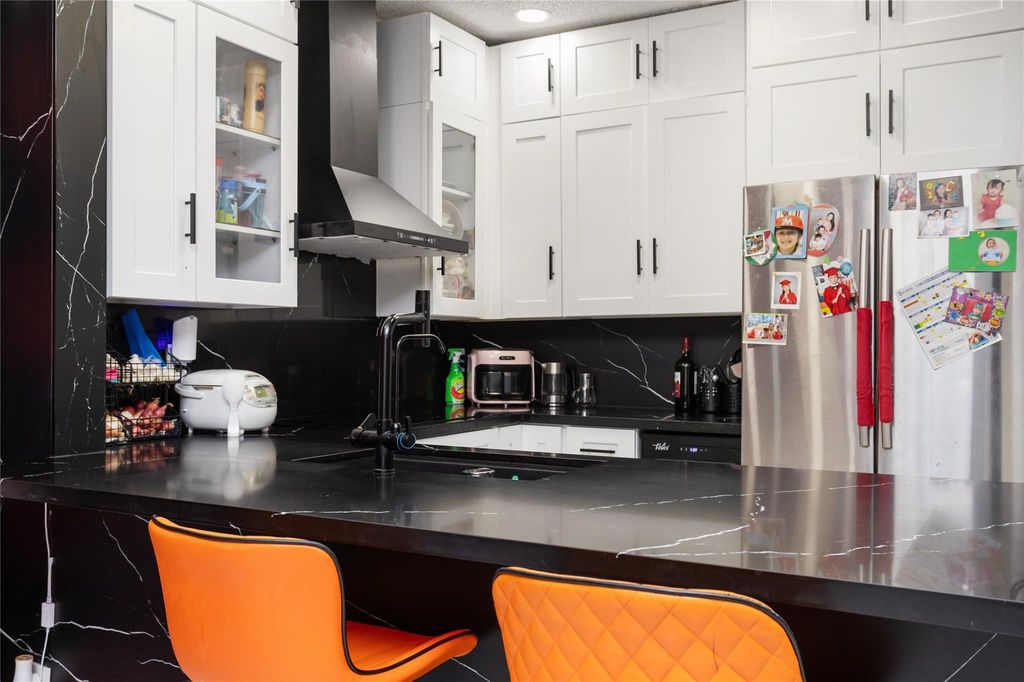 Photo of 1362 NW 126th Way, Sunrise, FL 33323 (MLS # F10545674)