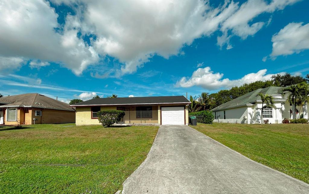 Photo of 1013 SW Mataro Avenue, Port Saint Lucie, FL 34953 (MLS # R11149174)