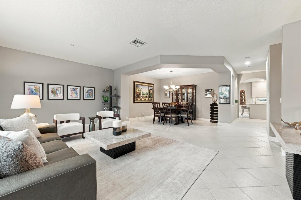Photo of 5545 NE Trieste Way, Boca Raton, FL 33487 (MLS # B26092413)
