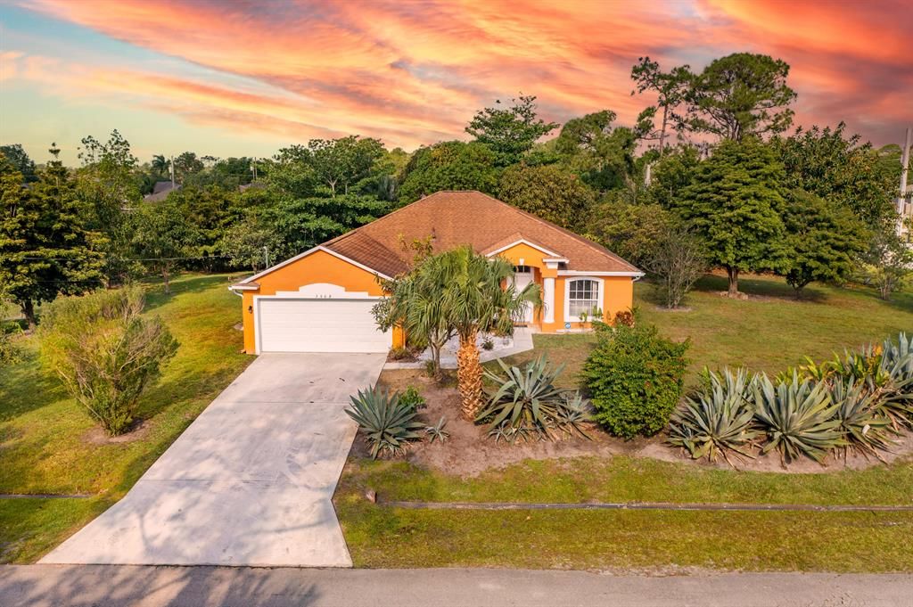Photo of 3608 SW Ballweg Street, Port Saint Lucie, FL 34953 (MLS # R10792963)