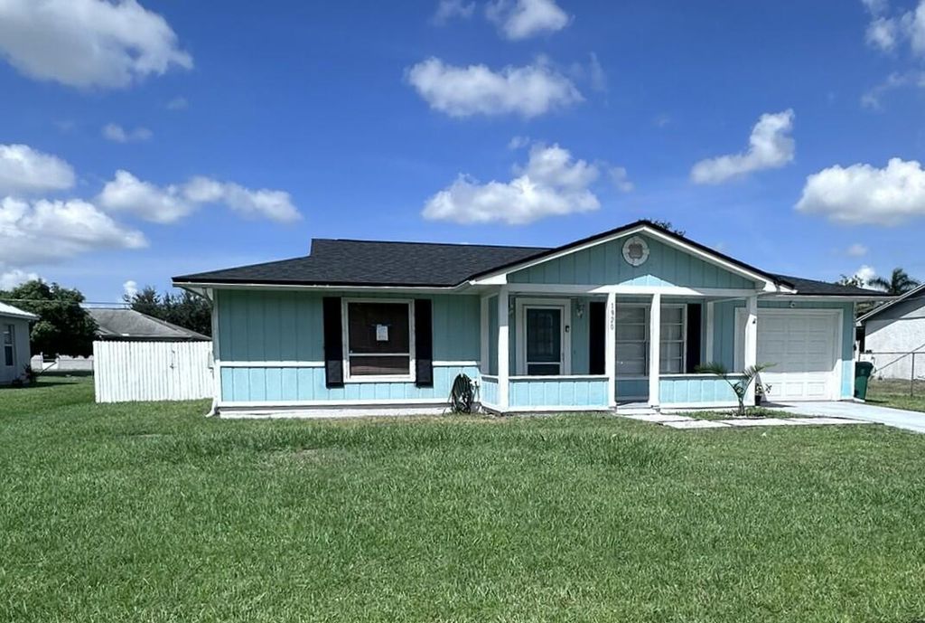 Photo of 1920 SW Taurus Lane, Port Saint Lucie, FL 34983 (MLS # R11092168)