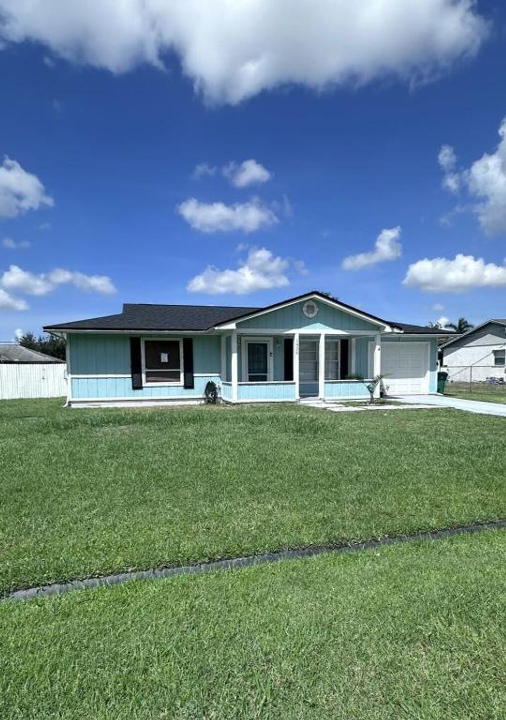 Photo of 1920 SW Taurus Lane, Port Saint Lucie, FL 34983 (MLS # R11092168)