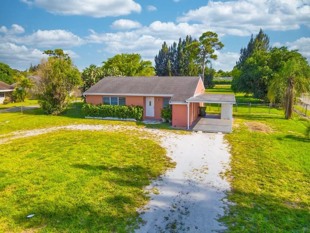 Photo of 3856 7th Avenue N, Palm Springs, FL 33461 (MLS # R10887303)