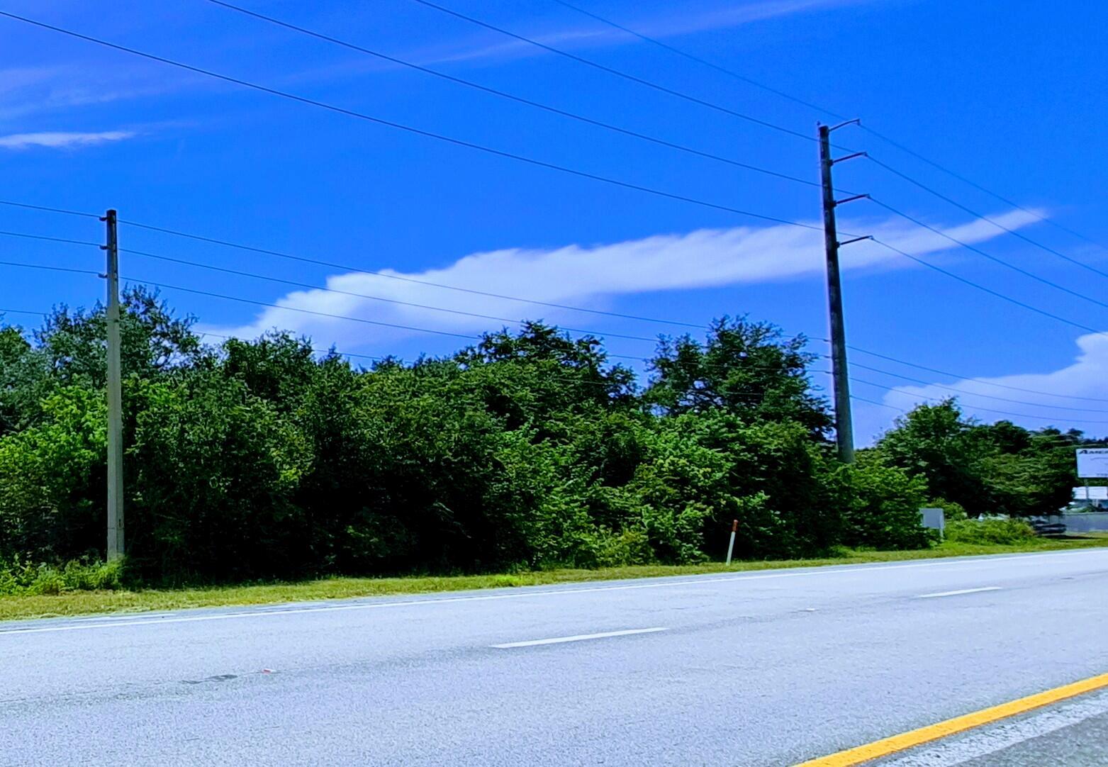 Prime 2.38-Acre Dual-Zoned Development Opportunity with High-Visibility US1 Frontage. Unlock the potential of this rare 2.38-acre parcel featuring 1.19 acres of high-exposure Commercial General (CG) zoning along bustling US Highway 1, and 1.19 acres zoned RS-4 Residential fronting N Old Dixie Highway. This unique split-zoning configuration offers exceptional flexibility, build your business along US1 and your residence or rental income property on the residential side.Situated on a heavily traveled corridor between Vero Beach and Fort Pierce, Minutes from Treasure Coast International Airport, Downtown Fort Pierce, and Hutchinson Island beaches (3.3 miles). Easy access to both I-95 (4.4 miles) and the Florida Turnpike (6.4 miles).