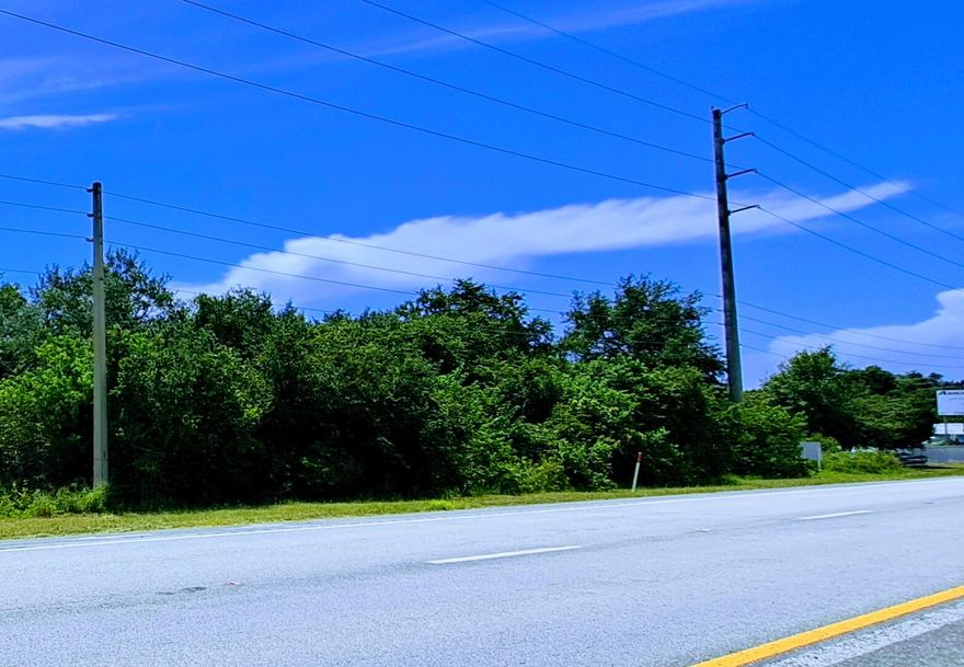 High-Visibility US1 Development Site Located Just 3 Miles from Treasure Coast International Airport - Ideal for Storage, Flex industrial builders, local contractor companies scaling up, small logistics companies, aviation-related service operators or Service Commercial Use. This operationally strategic Dual-Zoned Development is ideal for low-water demand commercial uses and priced below improved comparables, creating immediate built-in equity and margin for the buyer. Strategically located near established and growing communities including Lakewood Park, Holiday Pines (golf course community), Spanish Lake Fairways, Waterstone and the Lennar community bringing 650 new homes nearby.