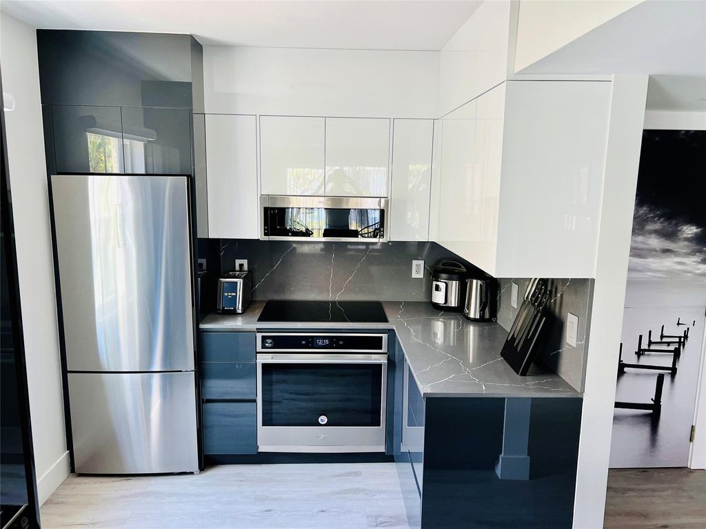 Photo of 1105 Lake Shore Drive #201, Lake Park, FL 33403 (MLS # F10447732)