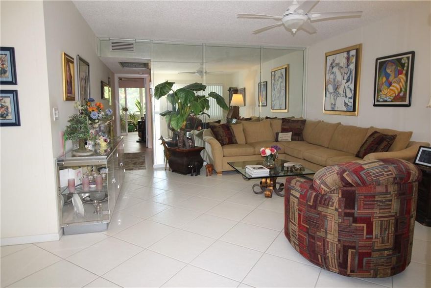 FEEL LIKE YOU ARE ON VACATION EVERYDAY IN THE BEAUTIFUL CENTURY VILLAGE!  THIS 4TH FLR, LUXURY 2 BDRM, 2 BATH CONDO HAS A LOVELY SERENE VIEW OF THE PRESERVE & IS CLOSE TO THE EAST GATE! FEATURES INCLUDE WHITE CERAMIC TILE THRU-OUT, UPDATED VANITY IN PRIMARY BATH & TILE SHOWER STALL IN GUEST BATH W/GLASS BLOCK & GRAB BARS! NEW ELECT PANEL & A/C & HOT WATER HEATER ONLY 3 YRS OLD!! PATIO IS ENCL W/PLEXIGLASS WINDOWS & HAS A LG CLOSET FOR EXT STORAGE.  UNIT IS PARTIALLY FURNISHED. NEW ROOF 2023 & ASSESSMENT HAS BEEN PAID! ACTIVE ADULT GATED COMMUNITY OFFERING RESORT STYLE LIV W/LOTS OF AMENTIES INCL. LG CLUBHOUSE, 15 POOLS, TENNIS COURTS, PICKLEBALL, INDR/OUTDR POOLS, GYM, & SO MUCH MORE! JUST MIN TO THE BEACH, RESTAURANTS, SHOPPING & ENTERTAINMENT! PRICED TO SELL! YOU WILL LOVE LIVING HERE!