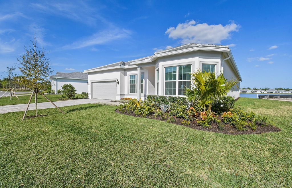 Photo of 9821 SW Legacy Drive, Stuart, FL 34997 (MLS # R10968016)