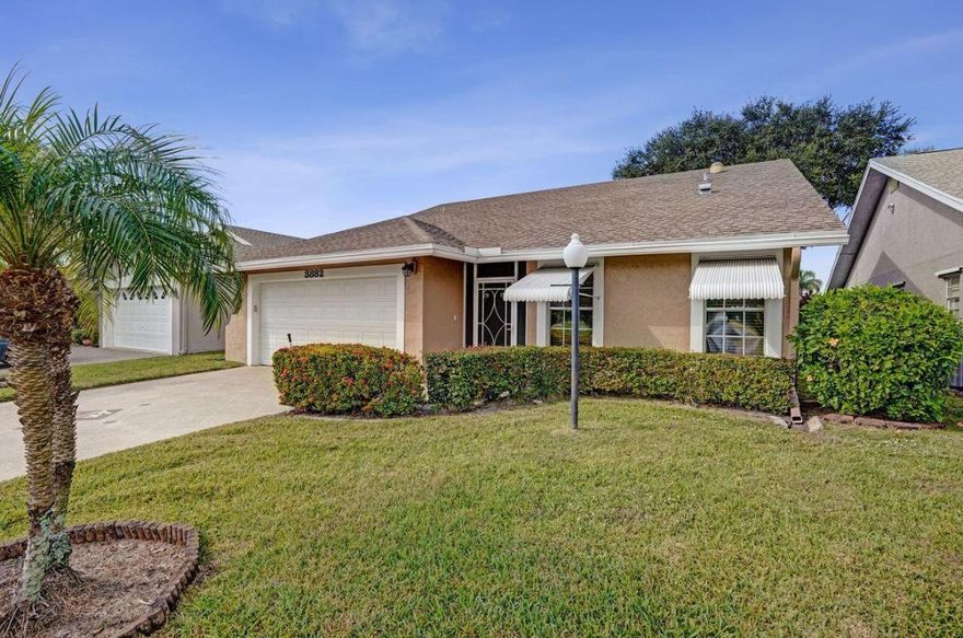 Bright & Spacious 2BR/2BA home with 2 car garage in the gated 55+ community of Cypress Lakes! This well maintained residence features an open, updated kitchen with modern finishes, a split floor plan, and sun tubes that fill the home with beautiful natural light. Enjoy a private backyard and screened outdoor space perfect for quiet relaxation. Community perks include FREE golf on the 18 hole course, 2 pools, spa, fitness center, pickleball, tennis, mini golf, billiards, shuffleboard, clubhouse events & more. Low HOA and a prime West Palm Beach location close to shopping, dining, downtown, beaches, I95 & the Turnpike. A wonderful home in a vibrant, active community!