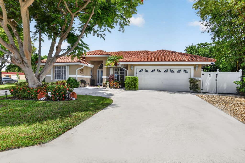 Photo of 703 AVOCET Road, Delray Beach, FL 33444 (MLS # B26062705)