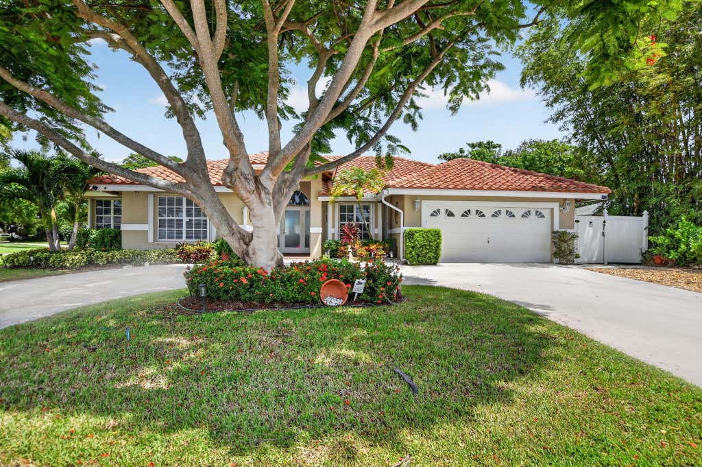 Photo of 703 AVOCET Road, Delray Beach, FL 33444 (MLS # B26062705)