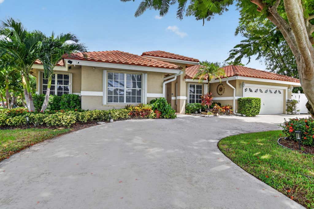 Photo of 703 AVOCET Road, Delray Beach, FL 33444 (MLS # B26062705)
