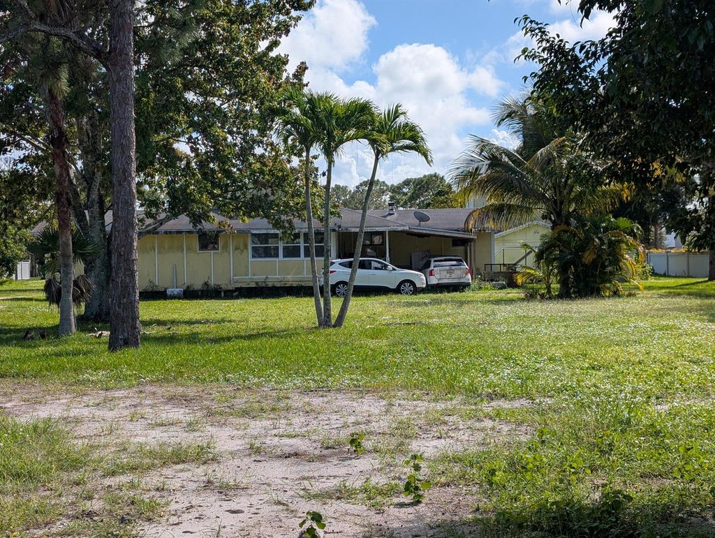 Photo of 1500 SE Cove Road, Stuart, FL 34997 (MLS # R11133977)
