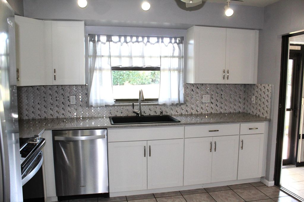 Photo of 9945 Papaya Tree Trail #B, Boynton Beach, FL 33436 (MLS # B26008328)