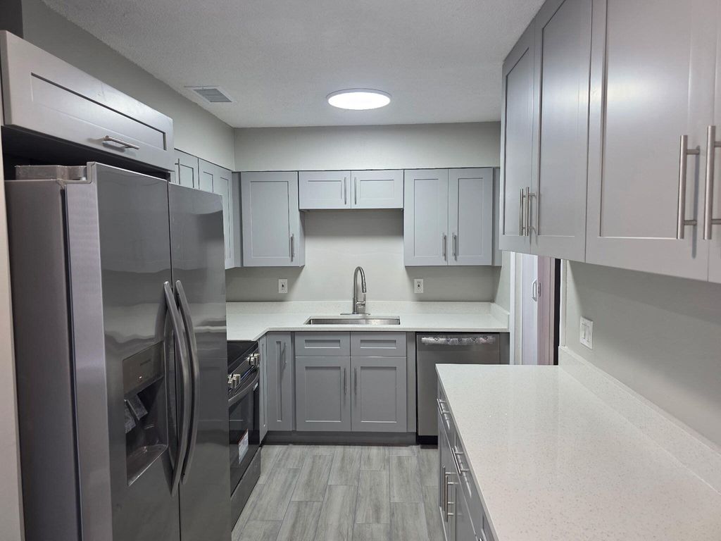 Photo of 3044 SE Camino Avenue, Stuart, FL 34997 (MLS # B26002362)