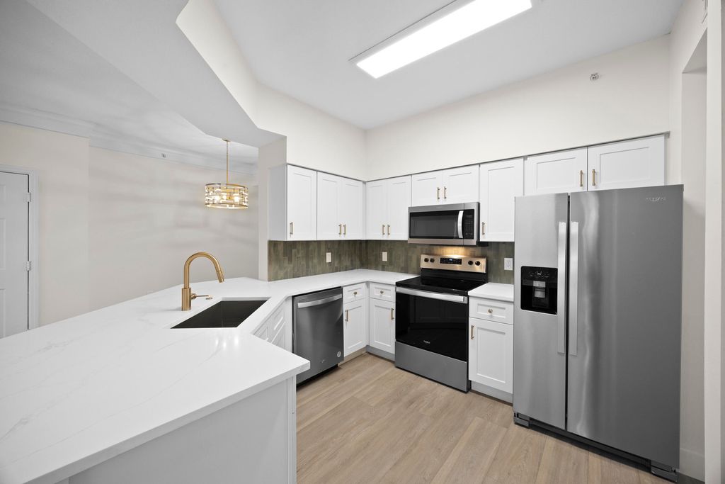 Photo of 9845 Baywinds Drive #6203, West Palm Beach, FL 33411 (MLS # B26004242)