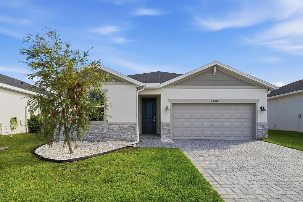 Photo of 8558 Dahlia Circle, Port Saint Lucie, FL 34986 (MLS # B26008325)
