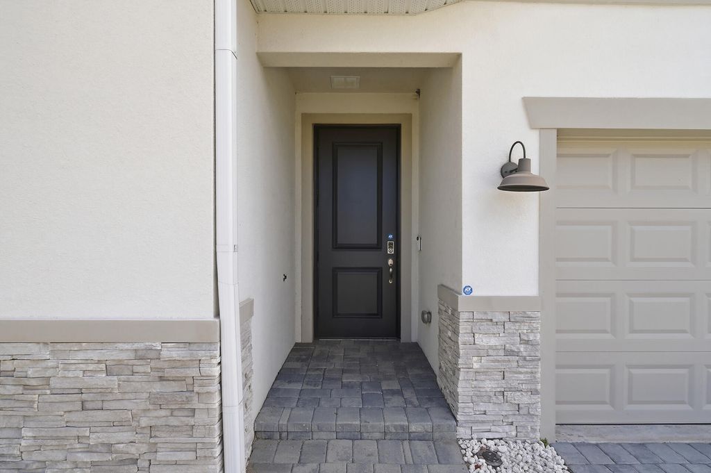 Photo of 8558 Dahlia Circle, Port Saint Lucie, FL 34986 (MLS # B26008325)