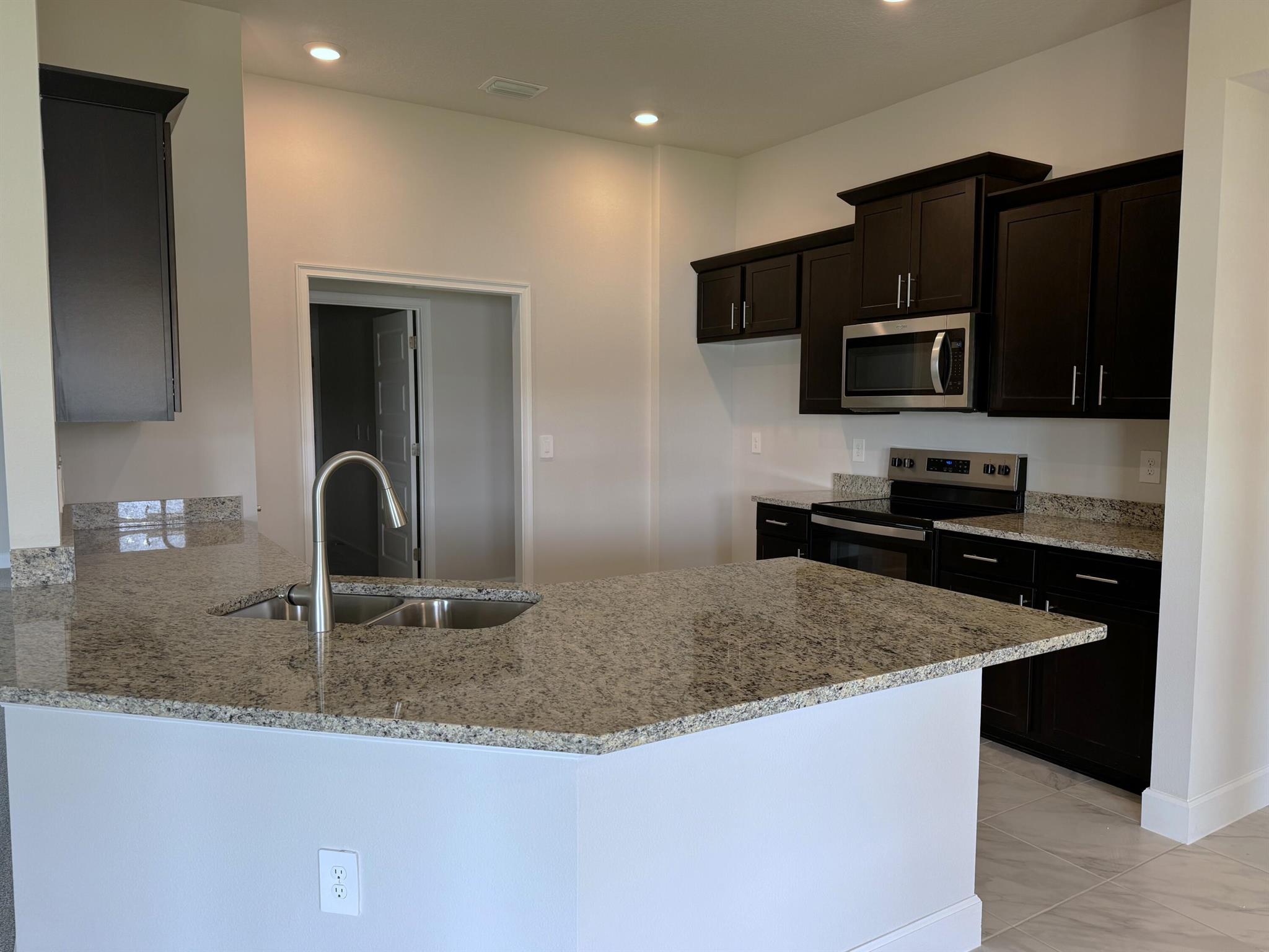 Photo 10 of 29 of 8741 Waterstone Boulevard townhome