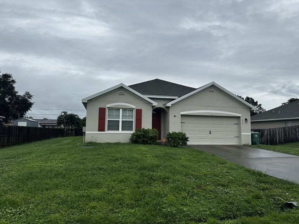 Photo of 619 SW Post Terrace, Port Saint Lucie, FL 34953 (MLS # R11113230)