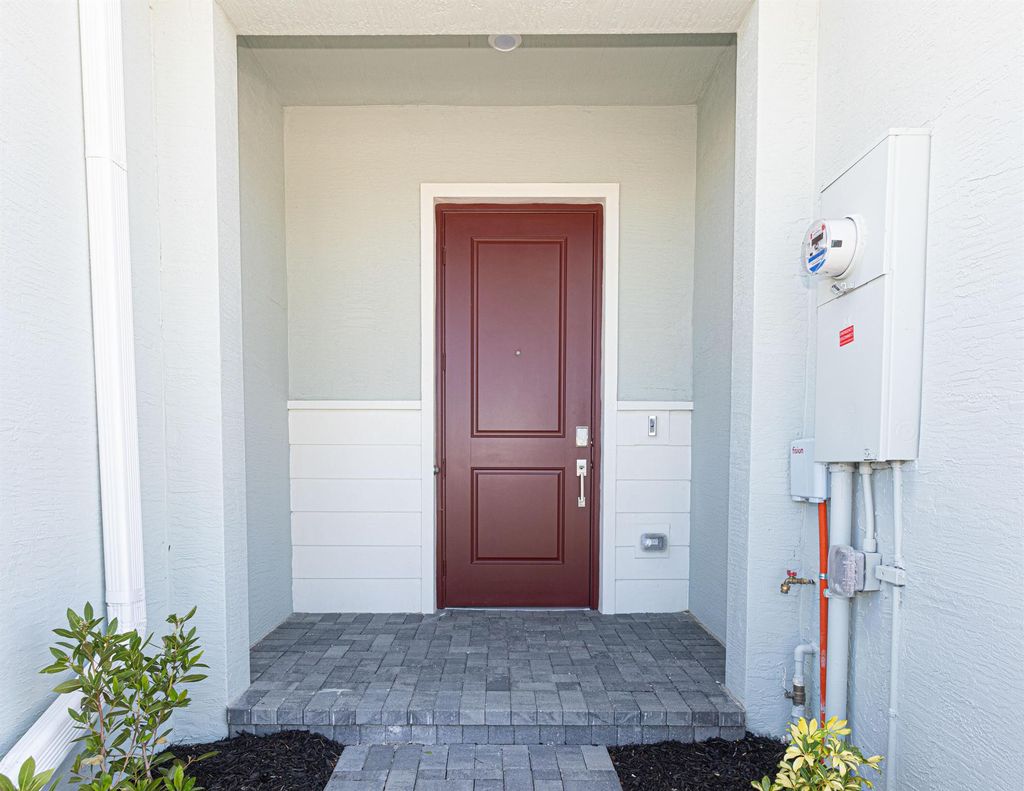 Photo of 341 SE Crossoak Lane, Port Saint Lucie, FL 34984 (MLS # R11073911)