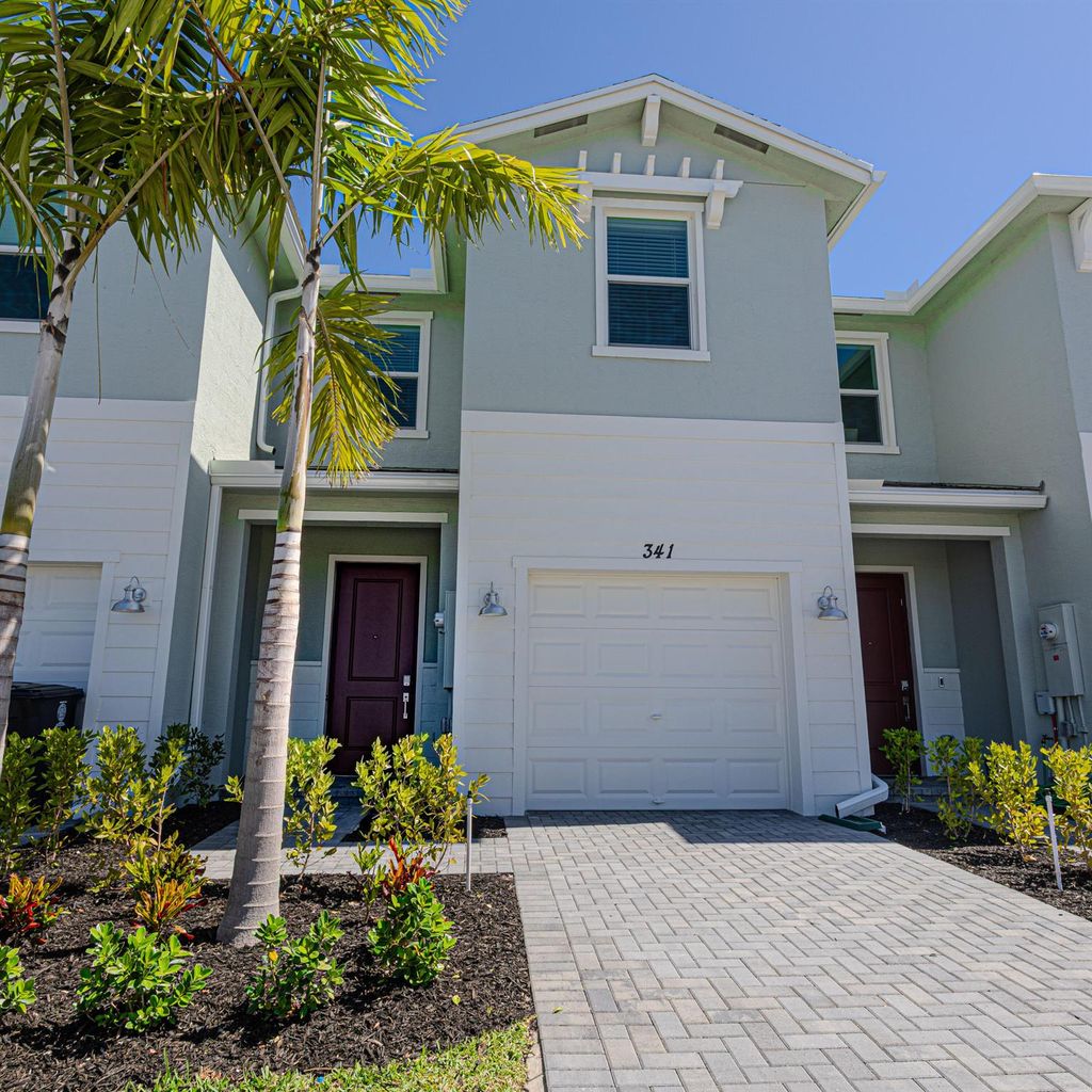 Photo of 341 SE Crossoak Lane, Port Saint Lucie, FL 34984 (MLS # R11073911)
