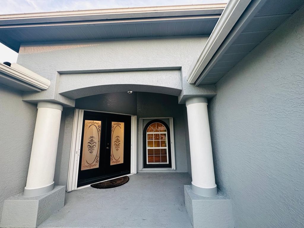 Photo of 1074 SW Sultan Drive, Port Saint Lucie, FL 34953 (MLS # R10993750)