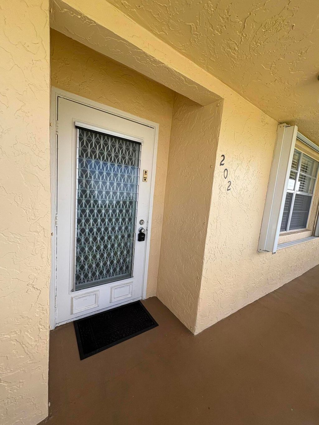 Photo of 1421 NW 19th Terrace #202, Delray Beach, FL 33445 (MLS # R11169904)