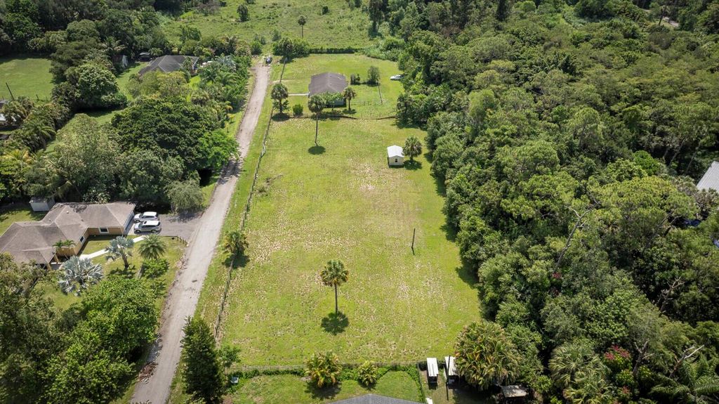 Photo of 13886 22nd Road N, Loxahatchee Groves, FL 33470 (MLS # R11106054)