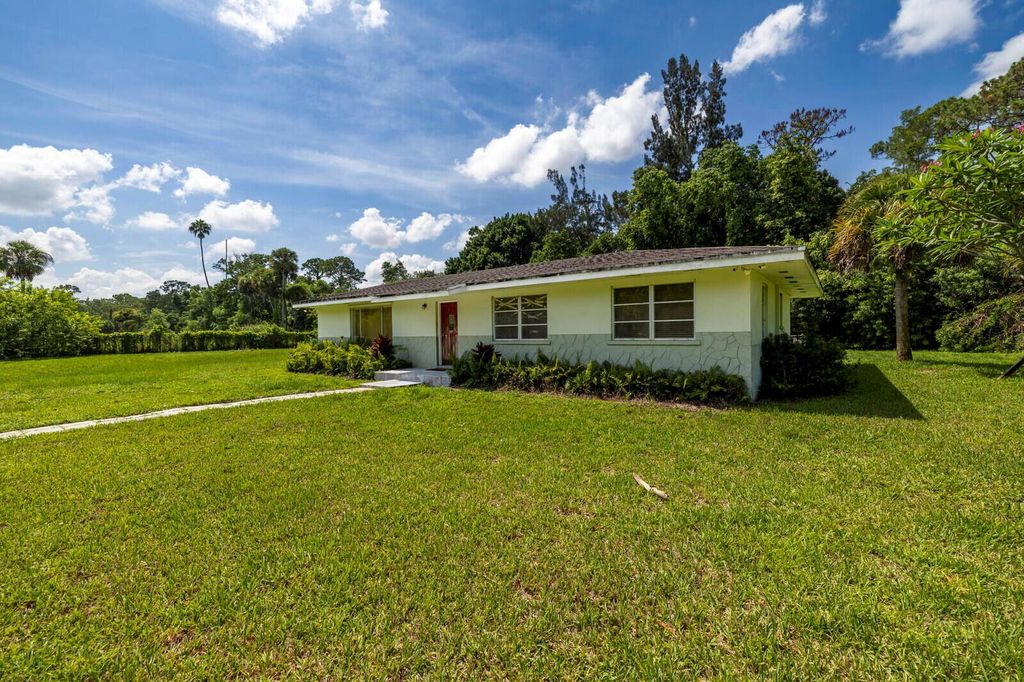 Photo of 13886 22nd Road N, Loxahatchee Groves, FL 33470 (MLS # R11106054)
