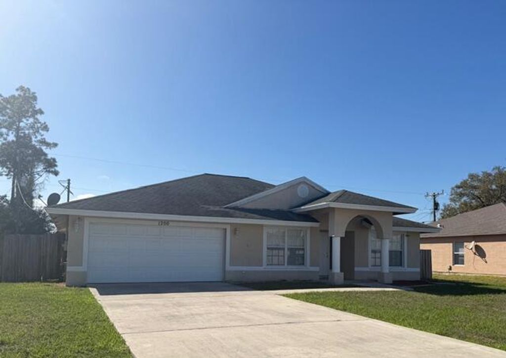 Photo of 1200 SE Ladner Street, Port Saint Lucie, FL 34983 (MLS # B26000176)