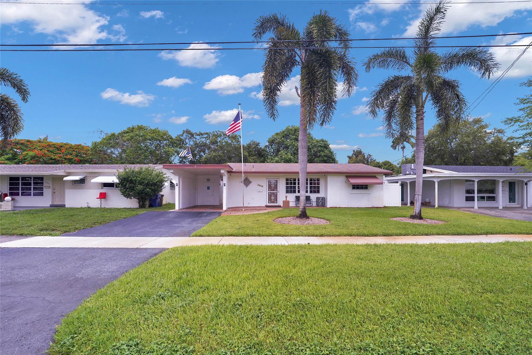 Welcome to paradise. Nestled in a quiet neighborhood this 2 bedroom/2 bathroom home sits on a huge fenced in lot that has enough room for a pool. The backyard boasts a sitting dock on the canal, a large mango tree and a private shed. The home has been taken excellent care of and is in immaculate condition. If you are looking for both tranquility and convenience this is the perfect home. You are close to schools, shopping, parks, beaches, hospitals and airports but you are also in your own private oasis. Bonus: there is NO HOA!! Please do not miss the opportunity to purchase this great property!!!