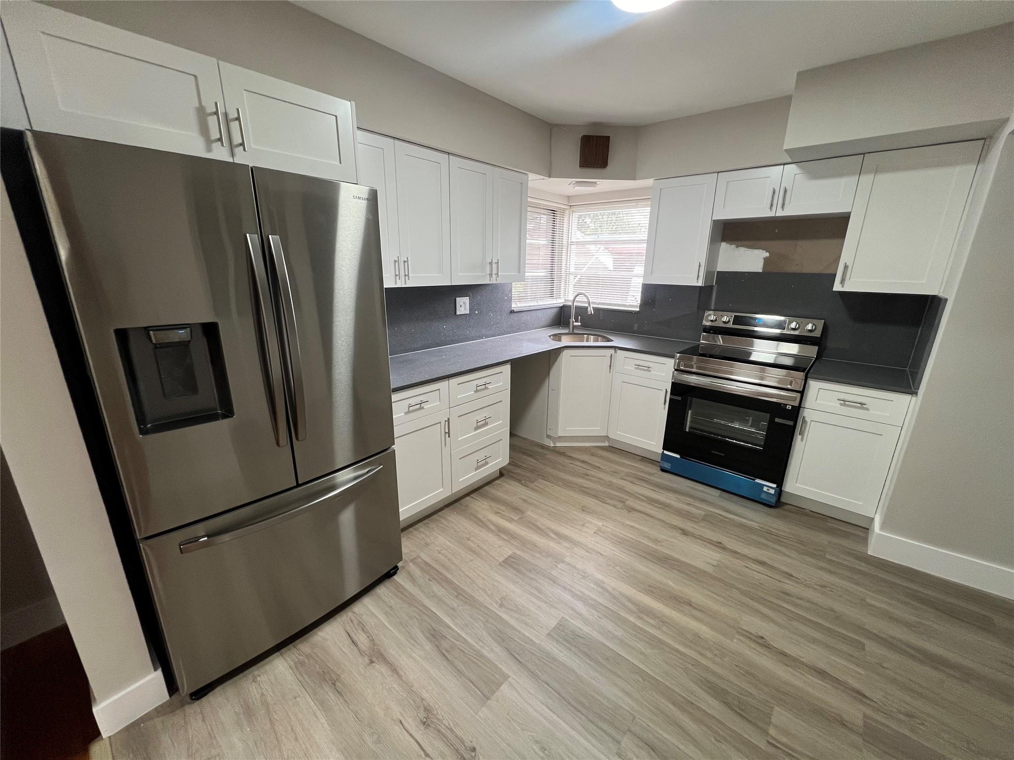 Beautiful, modern design, move in ready 3 bedroom 2 bath available for rent in the heart of Hialeah. Features a modern kitchen with granite countertops and stainless steel appliances. Hardwood floors throughout the unit. Washer/dryer in common area. Please send complete offer. ID, last 2 bank statements, last 2 pay stubs, and a background/credit/eviction check for every adult.
