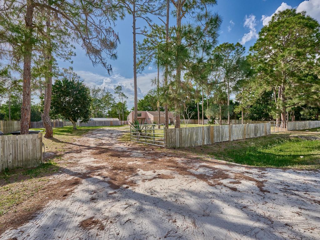 Photo of 4751 126th Drive N, West Palm Beach, FL 33411 (MLS # R11024575)