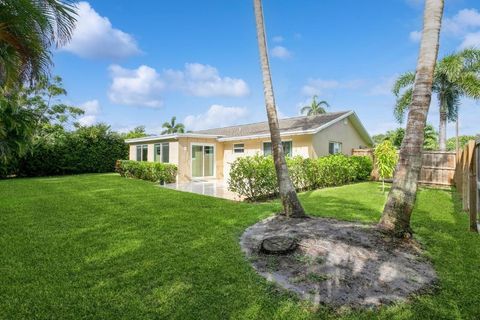 Photo of 1615 Venus Avenue, Jupiter, FL 33469 (MLS # R11155028)