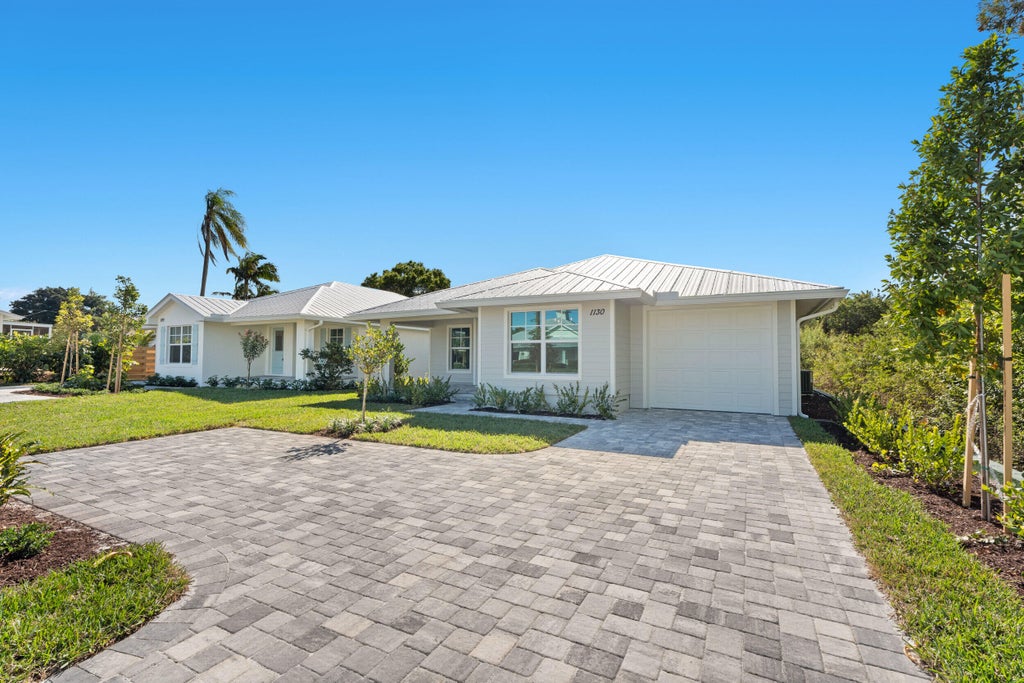Photo of 1130 SW 34th Street, Palm City, FL 34990 (MLS # B26038991)