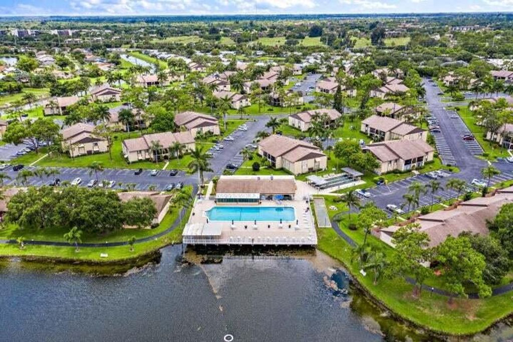 Photo of 441 Pine Glen Lane #D-2, Greenacres, FL 33463 (MLS # B26015434)