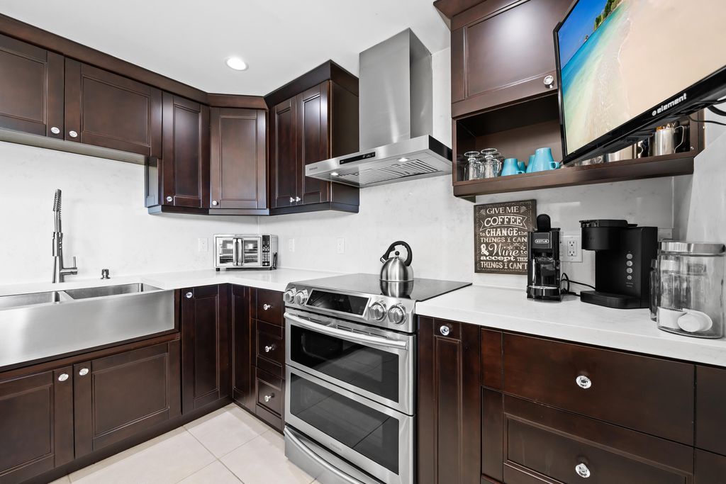 Photo of 3095 N Course Drive #702, Pompano Beach, FL 33069 (MLS # B26027787)