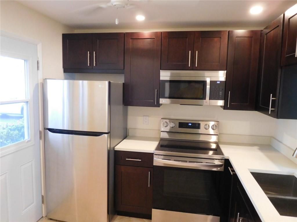 Photo of 1001 NE 14th Ave #104, Hallandale Beach, FL 33009 (MLS # F10323972)