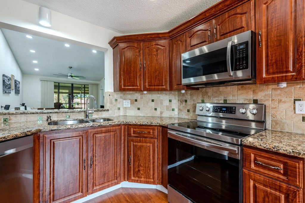 Photo of 7599 Glendevon Lane #1507, Delray Beach, FL 33446 (MLS # B26010886)