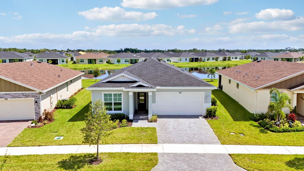 Photo of 1113 SE CROSSWOOD Way, Port Saint Lucie, FL 34984 (MLS # B26066790)