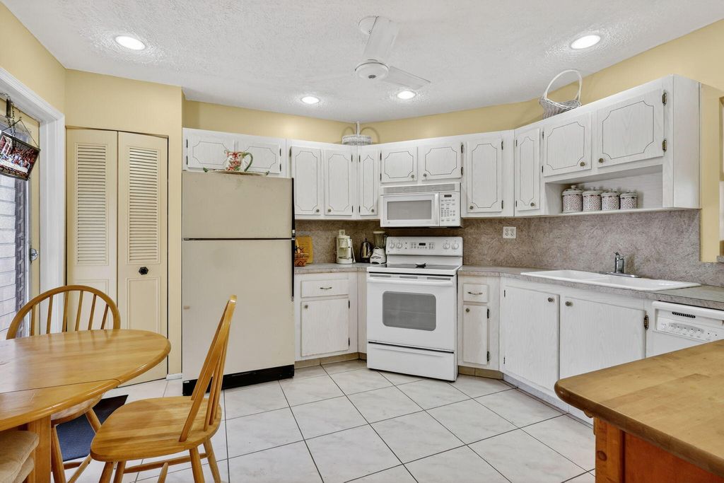 Photo of 6 Greenway Village Vlg N #210, Royal Palm Beach, FL 33411 (MLS # R11121775)