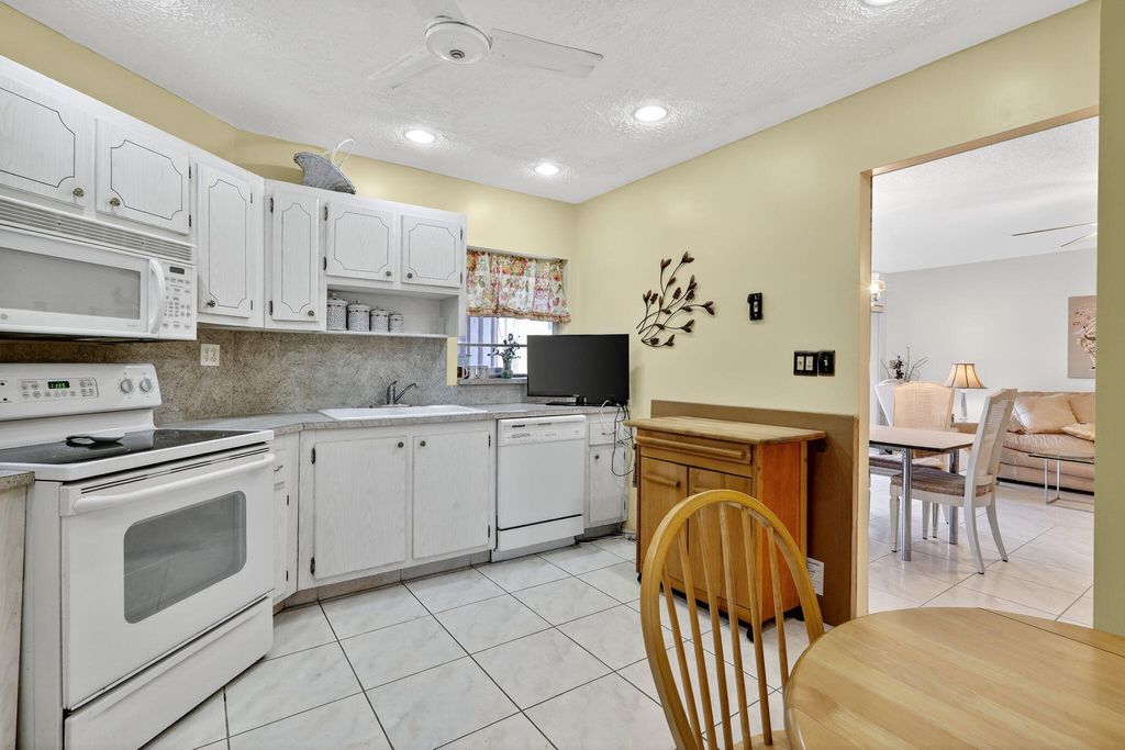 Photo of 6 Greenway Village Vlg N #210, Royal Palm Beach, FL 33411 (MLS # R11121775)