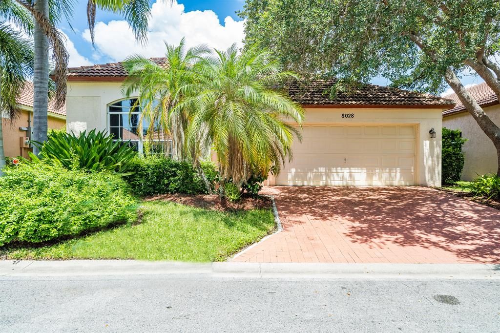 Photo of 8028 Via Hacienda, Riviera Beach, FL 33418 (MLS # R10815148)