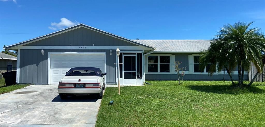 Photo of 2331 SE Bounty Avenue, Port Saint Lucie, FL 34952 (MLS # R10739862)
