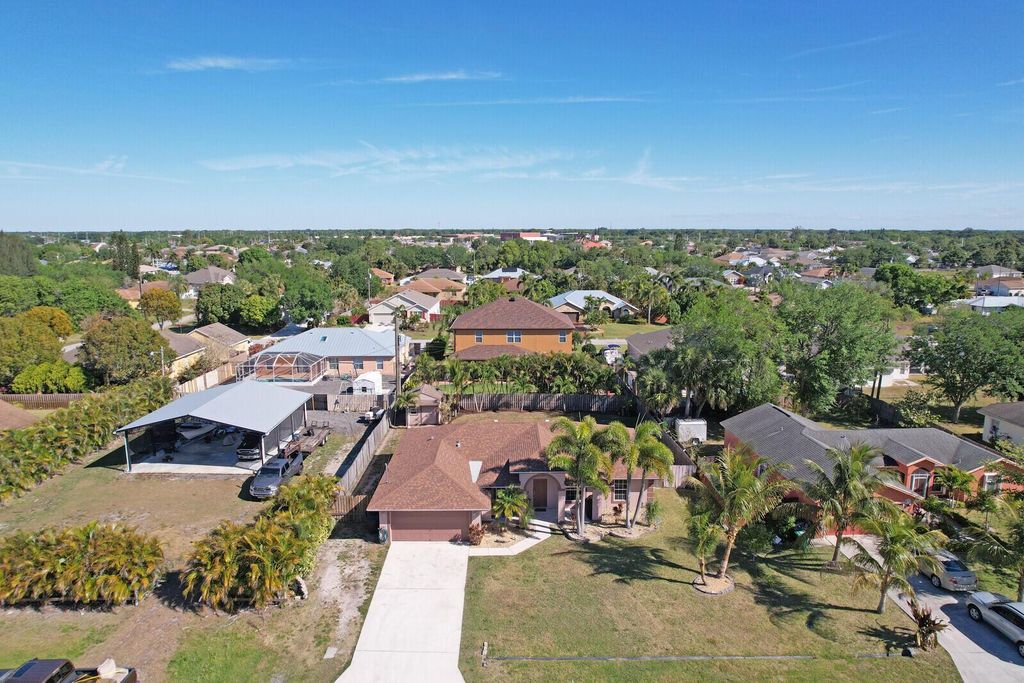 Photo of 571 SW Baoy Avenue, Port Saint Lucie, FL 34953 (MLS # R11086023)